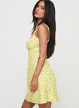 side view of model wearing Princess Polly Georgia Mini Dress Yellow Floral Plunger 