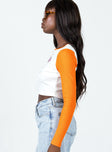 side view of model wearing Princess Polly Feed Your Soul Long Sleeve Top Orange 