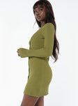 side view of model wearing Princess Polly Waldin Long Sleeve Mini Dress Olive V-Neck 