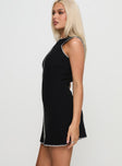 side view of model wearing Princess Polly Carlisha Knit Mini Dress Black / White Crew Neck 