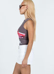   side view of model wearing Princess Polly Faya Low Rise Denim Mini Skirt White Mini Skirts 