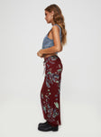   side view of model wearing Princess Polly Buchan Maxi Skirt Red Floral Maxi 