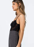 side view of model wearing Princess Polly Brentwood Bodysuit Black Sleeveless Sweetheart 