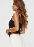 side view of model wearing Princess Polly Barlay Top Black Sleeveless Square Neck 