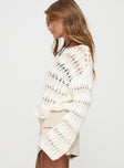 side view of model wearing Princess Polly Mistic Knit Sweater Cream Cropped 