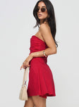 side view of model wearing Princess Polly Bradwell Strapless Mini Dress Red Tall Straight Neck 