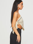 side view of model wearing Princess Polly Frankle Top Cream/black Sleeveless Asymmetric Neckline 