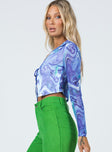 side view of model wearing Princess Polly Clyde Long Sleeve Top Blue 