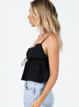 side view of model wearing Princess Polly Kellan Top Black Sleeveless V-Neck 