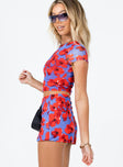   side view of model wearing Princess Polly Bold Move Mini Skirt Navy Floral Mini Skirts 