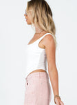 side view of model wearing Princess Polly Normani Top White Sleeveless Square Neck 