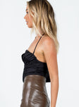 side view of model wearing Princess Polly Hidden Hills Bodysuit Black Sleeveless Plunger 