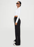 Front view of model wearing  front Princess Polly High Waisted Pants  Presson Cargo Pants Washed Black