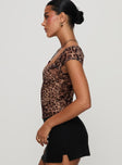 side view of model wearing Princess Polly Nerys Top Leopard Short Sleeves Square Neck 