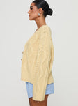 side view of model wearing Princess Polly Daxtan Cable Cardigan Lemon Cropped 