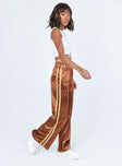 side view of model wearing Princess Polly Dave Trackpants Brown 