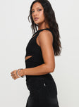 side view of model wearing Princess Polly Ablaze Cut Out Top Black Sleeveless High Neck 