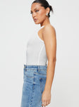 side view of model wearing Princess Polly Mayrelle Bodysuit White Sleeveless Boat Neck 