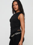 side view of model wearing Princess Polly Vulnerable One Shoulder Top Black Sleeveless Asymmetric Neckline 