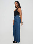 side view of model wearing Princess Polly Kalinda Denim Jeans Mid Blue High Waisted 