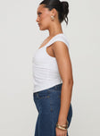 side view of model wearing Princess Polly Gatler Top White Short Sleeves V-Neck 