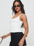 side view of model wearing Princess Polly Effortless Top White Sleeveless Scoop Neck 