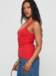 side view of model wearing Princess Polly Spirito Vest Top Red Sleeveless Scoop Neck 