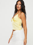 side view of model wearing Princess Polly Satina Top Yellow Sleeveless V-Neck 