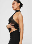 Front view of model wearing  front Princess Polly Sleeveless Asymmetric Neckline  Lux Tie Top Black