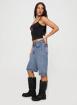 side view of model wearing Princess Polly Kurt Denim Culottes Acid Wash High Waisted Shorts 