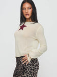 side view of model wearing Princess Polly Big Star Knit Sweater Cream Cropped 