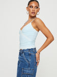 side view of model wearing Princess Polly Cinq Cami Top Baby Blue Sleeveless V-Neck 