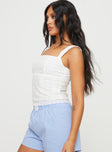 side view of model wearing Princess Polly Allegro Top White Sleeveless Square Neck 