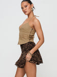   side view of model wearing Princess Polly Luned Mini Skirt Leopard Petite Mini Skirts 