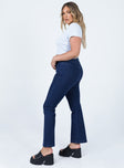 side view of model wearing Princess Polly Dalta Mid Rise Flare Denim Jeans Mid Rise 