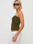 Strapless top Elasticated band at bust, asymmetric hem, split at side Good stretch, unlined 