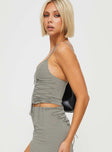 side view of model wearing Princess Polly Untouched Lace Up Top Grey Sleeveless Plunger 