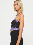 side view of model wearing Princess Polly Carmelo Top Black / Floral Sleeveless straight 