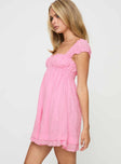 side view of model wearing Princess Polly Carlita Mini Dress Pink Square Neck 