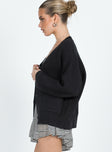 Front view of model wearing  front Burke Cardigan Black Princess Polly  