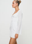 side view of model wearing Princess Polly Lyna Long Sleeve Mini Dress White Sweetheart Neckline 