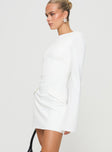 side view of model wearing Princess Polly Carters Long Sleeve Mini Dress White Crew Neck 