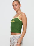 side view of model wearing Princess Polly Braz 1980 Top Green Sleeveless Square Neck 