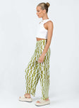 Front view of model wearing  front Princess Polly High Waisted Pants High Waisted Pants High Waisted Pants High Waisted Pants  Taina Pleated Wide Leg Pants Green Multi