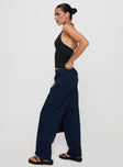 side view of model wearing Princess Polly Major General Cargo Pant Navy Low Rise Pants 