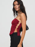 side view of model wearing Princess Polly Round The World Strapless Top Burgundy Sleeveless straight 