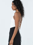 side view of model wearing Princess Polly Karlah Bodysuit White Sleeveless Square Neck 