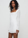 side view of model wearing Princess Polly Lanchester Long Sleeve Mini Dress White Square Neck 