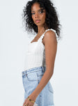 side view of model wearing Princess Polly Farrand Pointelle Bodysuit Ivory Sleeveless Square Neck 