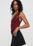 side view of model wearing Princess Polly Roan Lace Bodysuit Burgundy Sleeveless 